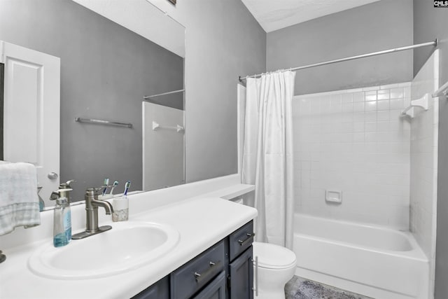 bathroom with vanity, toilet, and shower / bath combo