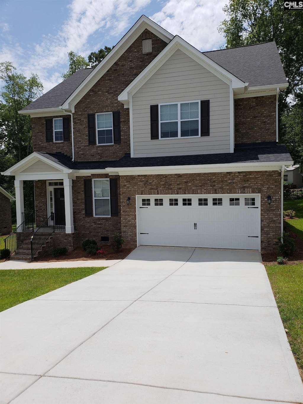 craftsman-style home featuring a garage, concrete driveway, a shingled roof, crawl space, and brick siding