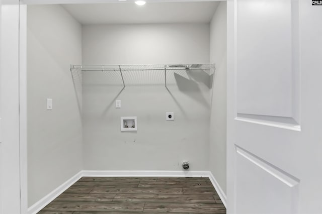 laundry area featuring dark wood-type flooring, baseboards, laundry area, hookup for a washing machine, and electric dryer hookup