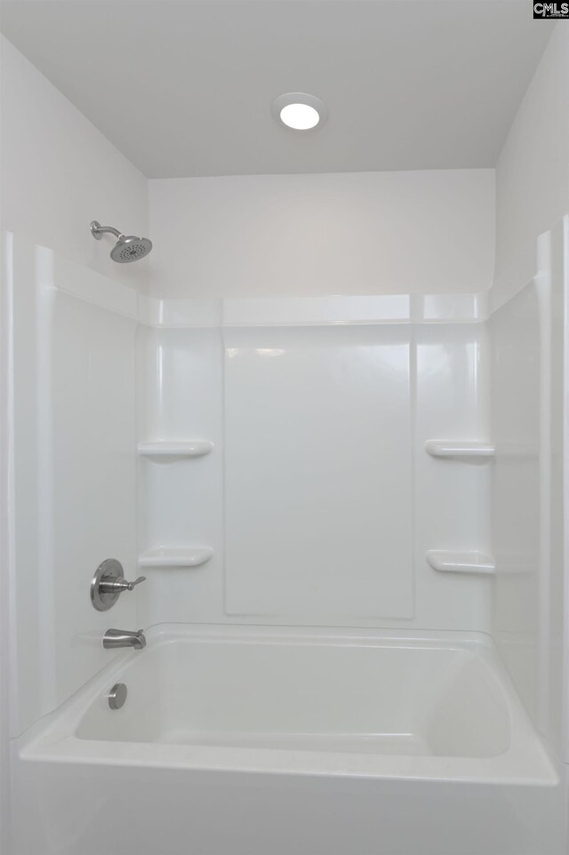 bathroom with shower / bathtub combination