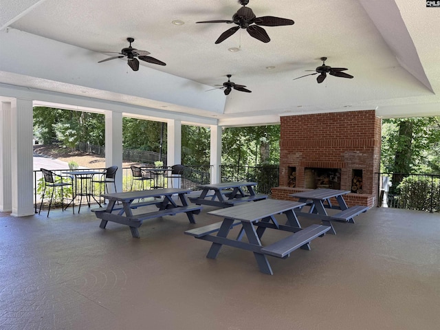 409 Telfair Way, Columbia, SC 29212 - view of patio featuring a brick fireplace, a ceiling fan, and outdoor dining area