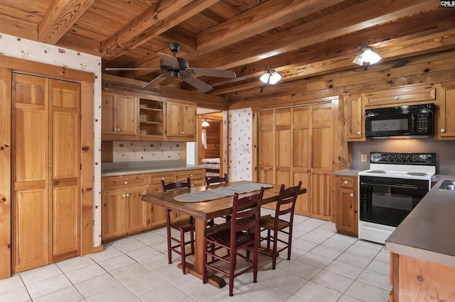 kitchen with electric range, light tile patterned floors, beamed ceiling, and black microwave