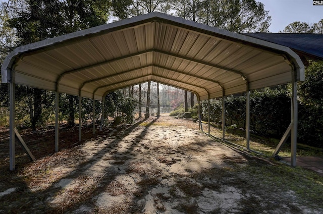 view of vehicle parking with a detached carport