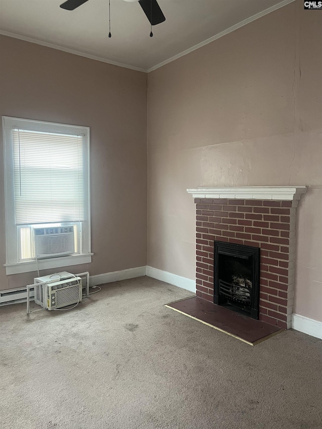 unfurnished living room with carpet flooring, a brick fireplace, crown molding, and baseboards