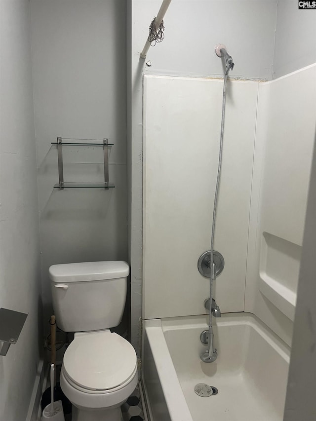 bathroom featuring toilet, a shower, and a bathtub