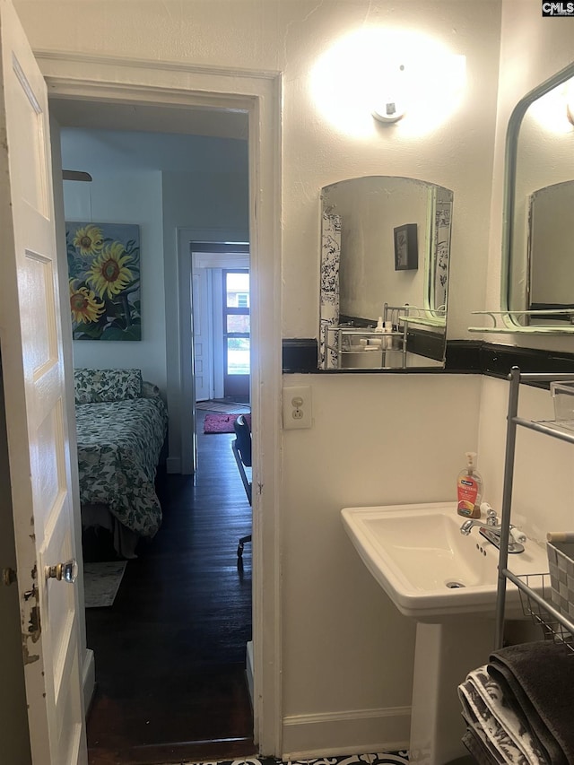 bathroom with wood finished floors