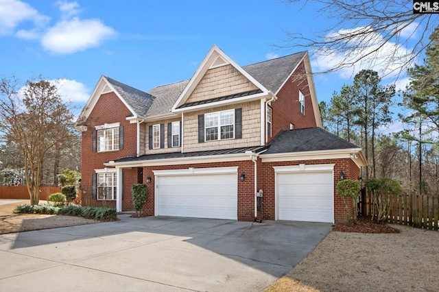 view of front of property with concrete driveway, an attached garage, fence, and brick siding