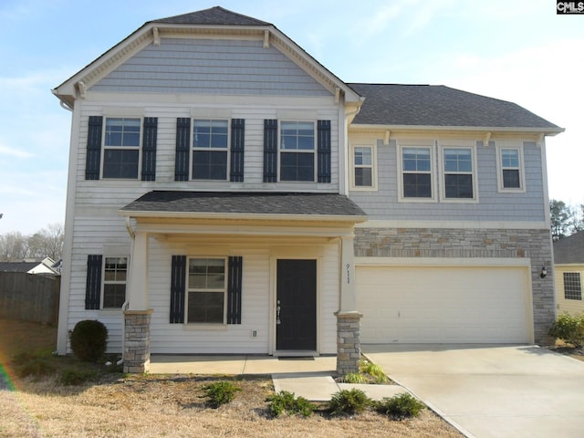 craftsman inspired home with stone siding, roof with shingles, concrete driveway, and an attached garage