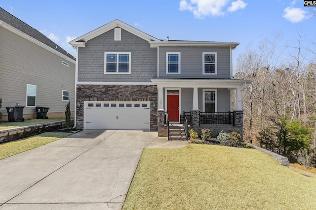 view of front facade with stone siding, a porch, concrete driveway, an attached garage, and a front yard