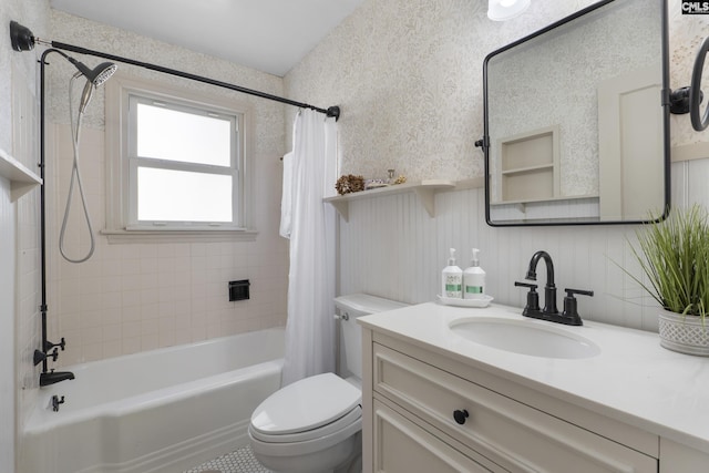 bathroom featuring vanity, toilet, shower / tub combo with curtain, and wallpapered walls