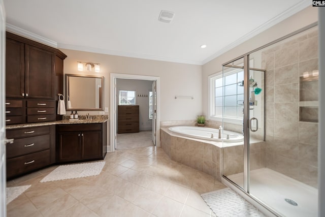 full bath featuring plenty of natural light, a shower stall, crown molding, and a garden tub