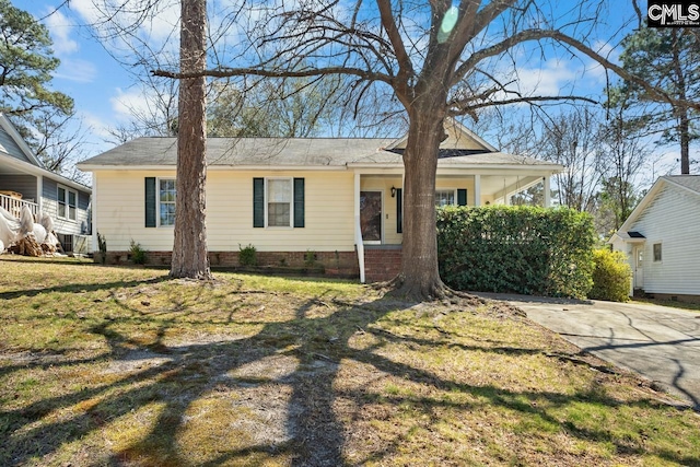 exterior space featuring crawl space and a front lawn