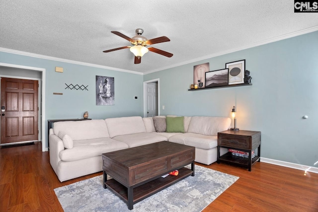 living area featuring ceiling fan, crown molding, wood finished floors, and a textured ceiling