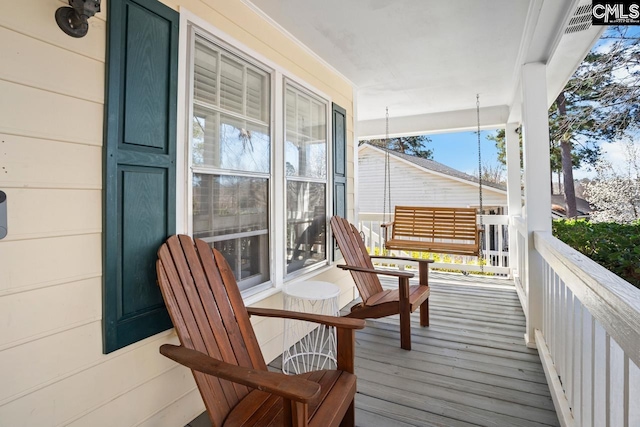 deck featuring a porch