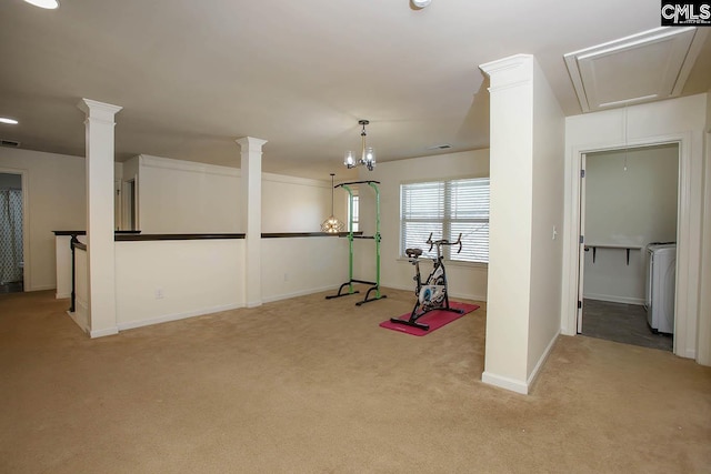 workout room featuring visible vents, carpet flooring, decorative columns, baseboards, and attic access