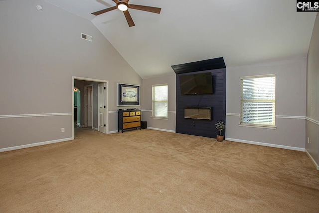 unfurnished living room with visible vents, baseboards, ceiling fan, light colored carpet, and a fireplace