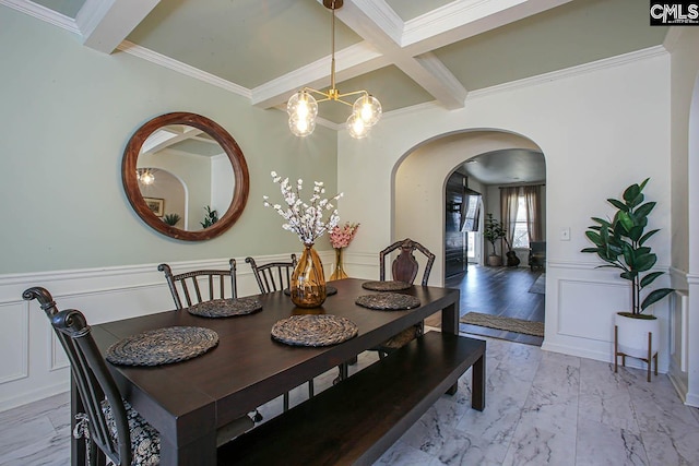 dining room featuring beam ceiling, marble finish floor, arched walkways, and coffered ceiling