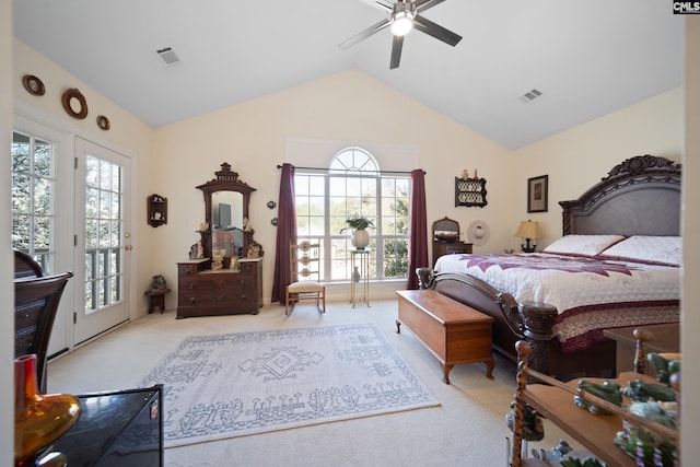 carpeted bedroom featuring access to outside, multiple windows, and visible vents