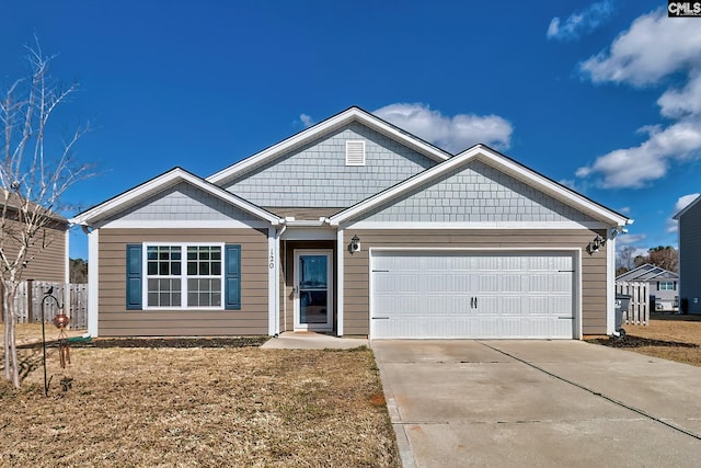 view of front of house with driveway and a garage