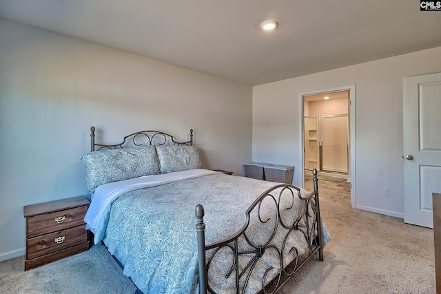 carpeted bedroom with baseboards