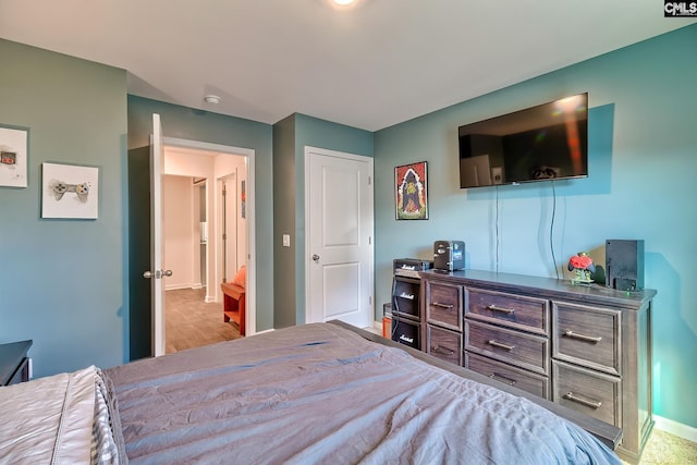 bedroom featuring baseboards