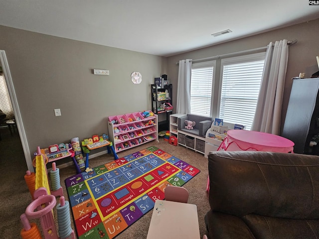 game room with visible vents and carpet