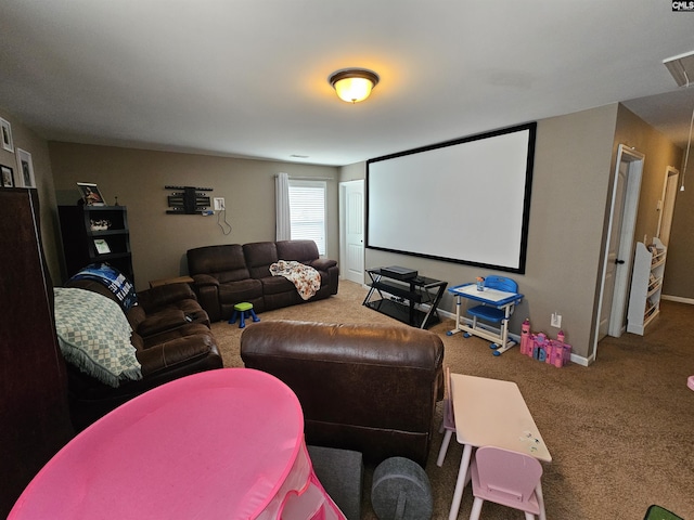 cinema with baseboards and carpet floors