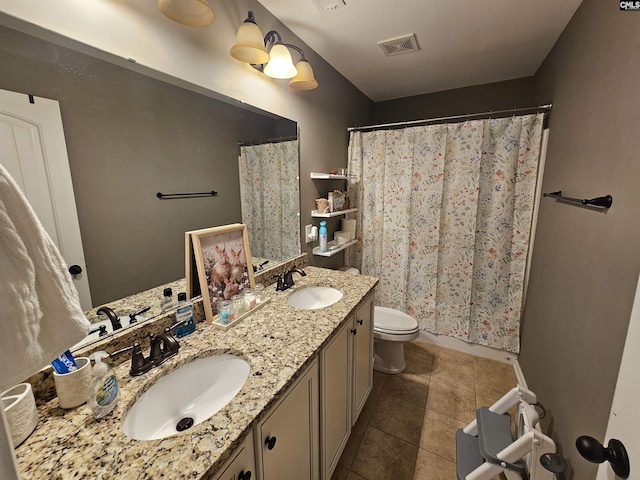 full bath featuring tile patterned floors, visible vents, toilet, and a sink