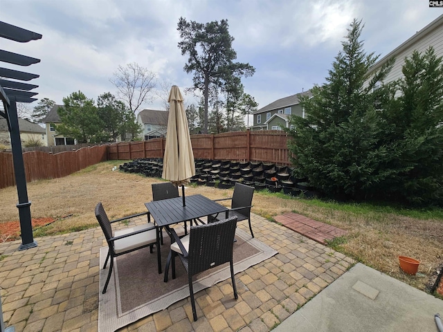 view of patio / terrace with a fenced backyard and outdoor dining space