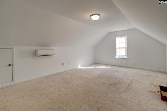 bonus room with baseboards, carpet floors, vaulted ceiling, and a wall unit AC