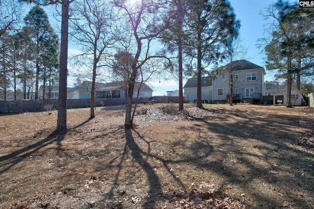 view of yard featuring fence