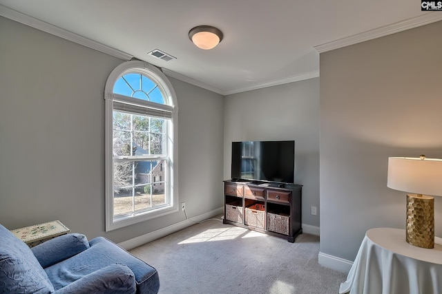 living room featuring crown molding, baseboards, visible vents, and carpet floors