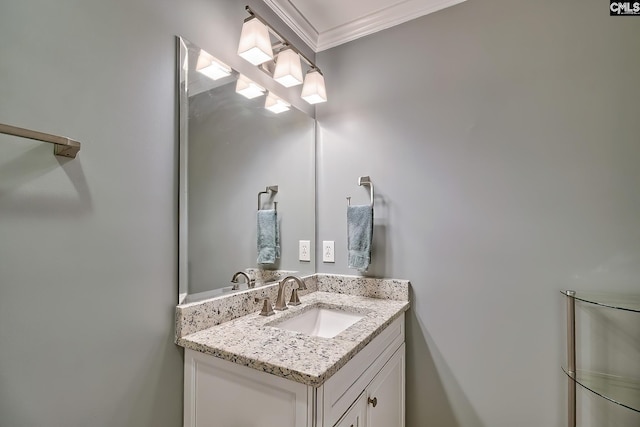 bathroom featuring vanity and crown molding