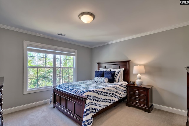 bedroom featuring visible vents, baseboards, light colored carpet, and ornamental molding