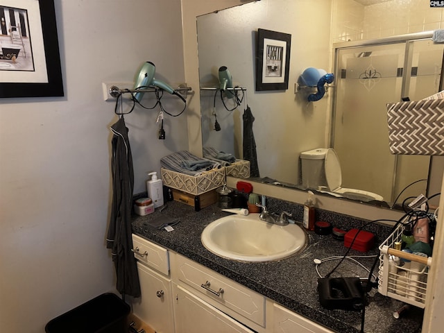 bathroom featuring vanity and a stall shower