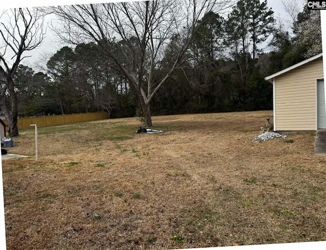 view of yard with fence