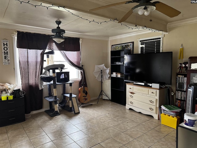 playroom featuring light tile patterned flooring, ornamental molding, and a ceiling fan