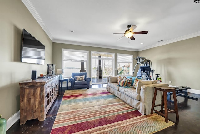 living room with ceiling fan, visible vents, baseboards, and ornamental molding