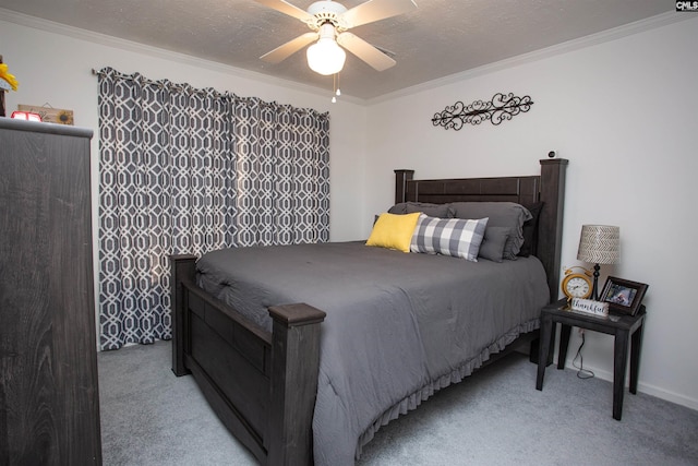 bedroom with a textured ceiling, ornamental molding, a ceiling fan, and light carpet