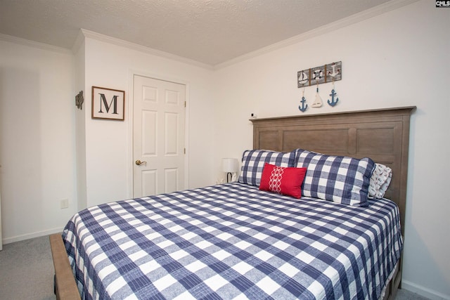 carpeted bedroom with baseboards, a textured ceiling, and crown molding