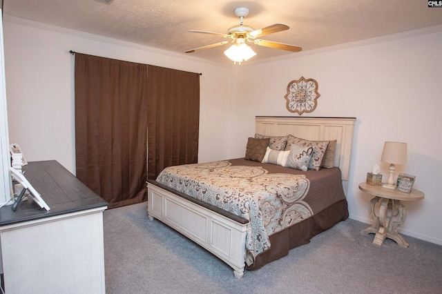 carpeted bedroom with a textured ceiling, ceiling fan, baseboards, and ornamental molding