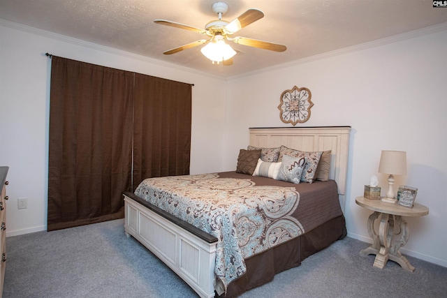 carpeted bedroom featuring baseboards, a textured ceiling, ceiling fan, and crown molding