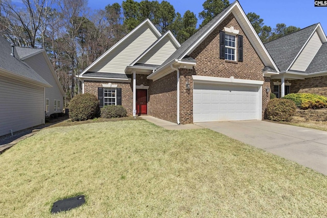 view of front facade with a garage, driveway, brick siding, and a front lawn