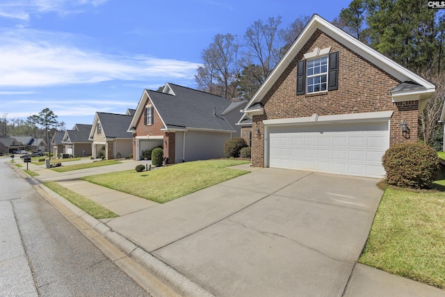 traditional home with brick siding, a residential view, driveway, and a front lawn