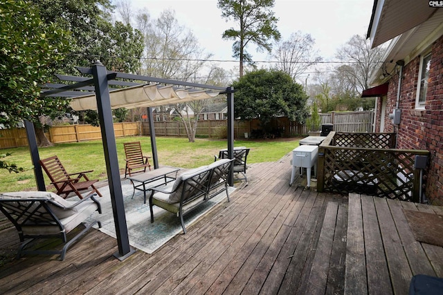 deck featuring a lawn, a pergola, and a fenced backyard