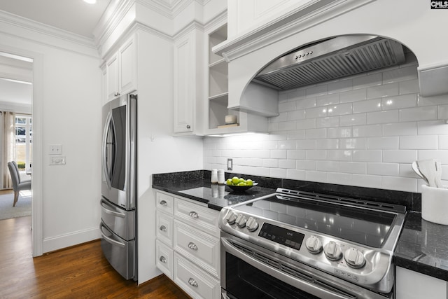 kitchen featuring dark wood-style floors, decorative backsplash, custom range hood, white cabinets, and appliances with stainless steel finishes