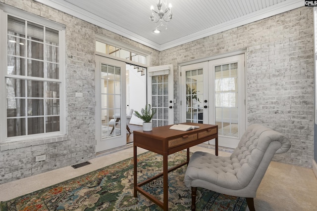 office space featuring visible vents, brick wall, ornamental molding, french doors, and a notable chandelier