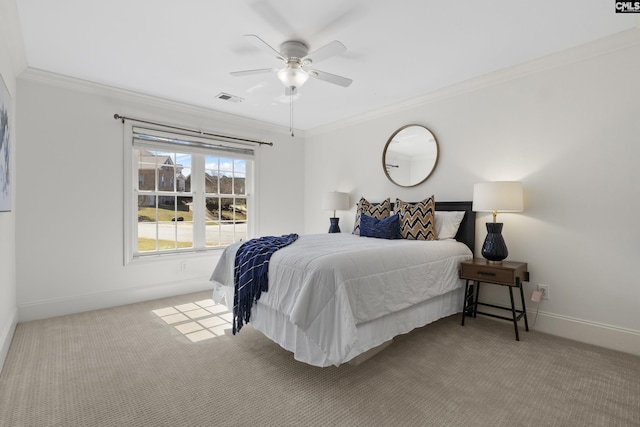 bedroom with baseboards, visible vents, carpet floors, and ornamental molding