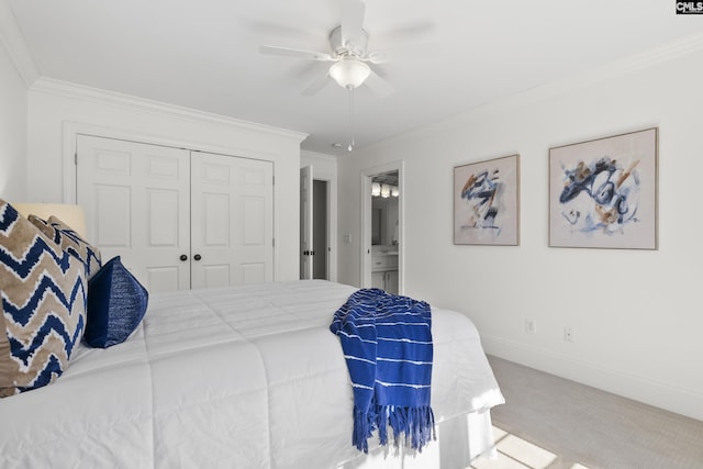 bedroom featuring ornamental molding, a ceiling fan, a closet, carpet floors, and baseboards