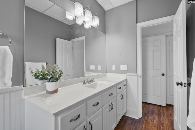 bathroom with vanity and wood finished floors